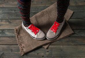 Color socks on a wooden floor photo