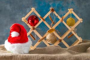 Christmas toy on natural sackcloth background photo