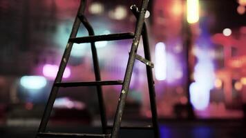 A wooden ladder sitting on top of a sidewalk video