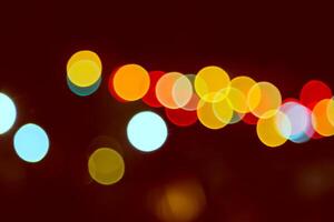 Color Bokeh against a dark photo