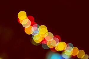 Color Bokeh against a dark photo