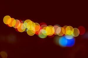 Color Bokeh against a dark photo