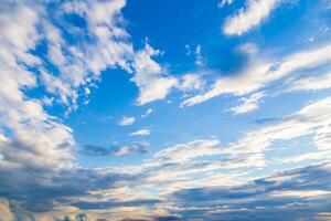 blue sky with tiny clouds photo