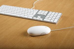 Modern aluminum computer keyboards and mouse for computer photo