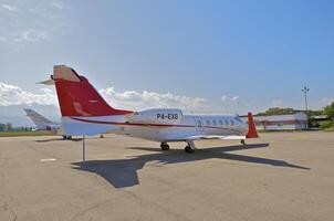 business plane parked at the airport photo