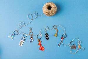 Souvenirs keychains from different cities of the world photo