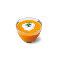 A vibrant carrot and ginger soup in a tall, slender glass dish, topped with a dollop of Greek yogurt png