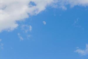 Clouds in the sky with moon photo