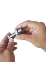 Nut and screw on hand, transparent background png