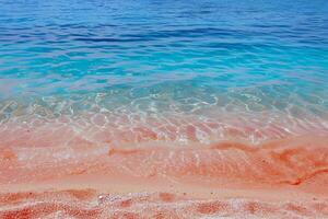 Beach with turquoise waters and golden sands, kissed by the warm sun of summer photo