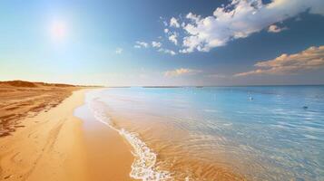 Beach with turquoise waters and golden sands, kissed by the warm sun of summer photo