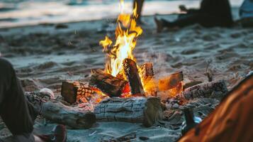 Bonfire crackling on the beach, surrounded by friends sharing stories on summer evening photo