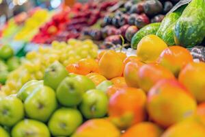 Colorful array of fresh fruits at farmer's market, bursting with flavors of the summer harvest photo