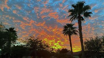 Sunset painting the sky with hues of orange, pink, and purple, signaling the end of summer day photo