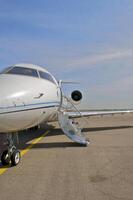 business plane parked at the airport photo