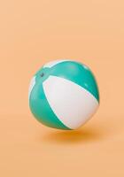 Inflated Beach Ball Floating on Peach Background photo