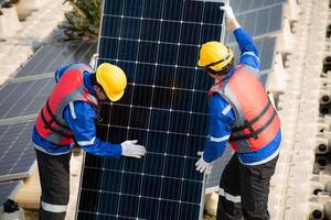 Photovoltaic engineers work on floating photovoltaics. Inspect and repair the solar panel equipment floating on the water. photo