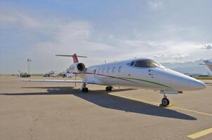 business plane parked at the airport photo