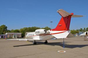 business plane parked at the airport photo