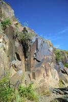 Petroglyphs within the Archaeological Landscape of Tamgaly. Almaty area, Kazakhstan photo