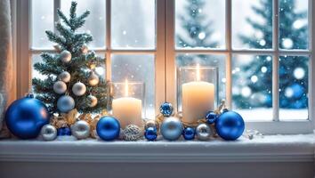 Window sill with Christmas balls, candles, Christmas tree celebration photo