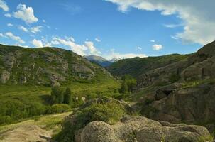 Beautiful view of valley with the mountains photo