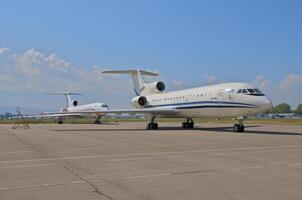 business plane parked at the airport photo