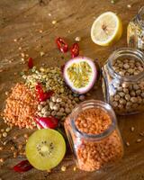 Raw cereals set on wooden background photo