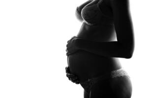 The beautiful young girl, the third trimester of pregnancy photo