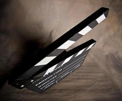 A movie production clapstick board. photo