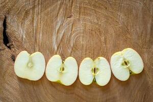 Fresh red apples on a wooden background photo