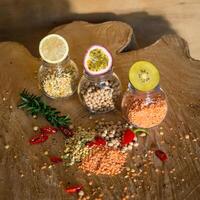 Raw cereals set on wooden background photo