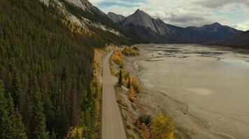 Vehicle driving on high mountain road through Medicine Lake video