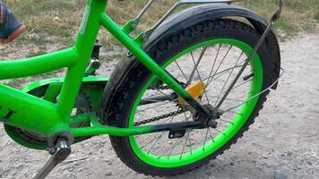 Cyclist on bicycle. Child is pedalling bike at the park video