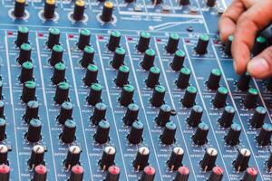 Audio mixing console closeup photo