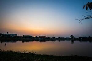 sunset of city on the park photo