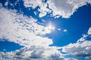 Sun, sky and clouds photo
