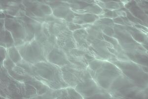 swimming pool with sunny reflections photo