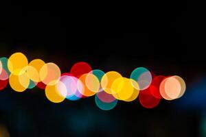 Color Bokeh against a dark photo