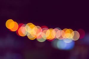 Color Bokeh against a dark photo