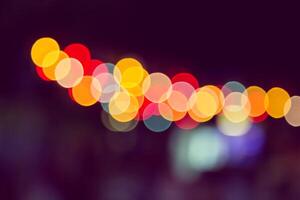 Color Bokeh against a dark photo