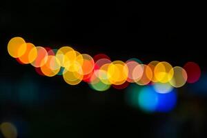 Color Bokeh against a dark photo