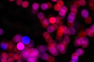 Color Bokeh against a dark photo