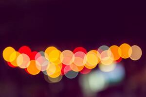 Color Bokeh against a dark photo