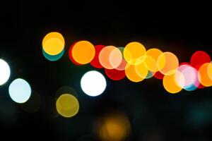 Color Bokeh against a dark photo