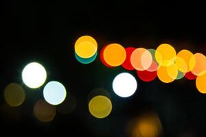 Color Bokeh against a dark photo