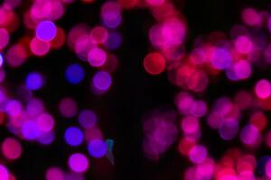 Color Bokeh against a dark photo