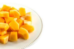 Sliced melon,cantaloupe in white disk on white background photo