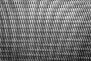 Synthetic rattan texture weaving background as used on outdoor garden furniture. photo