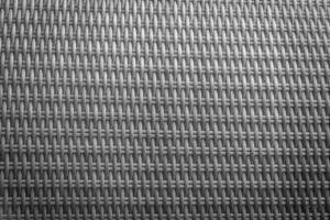 Synthetic rattan texture weaving background as used on outdoor garden furniture. photo